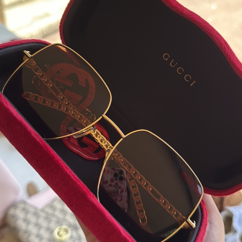 Authentic Gucci Sunglasses w/ red charms